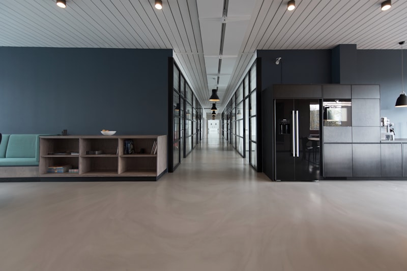 Calm modern office workspace with lounge seating and soft natural light